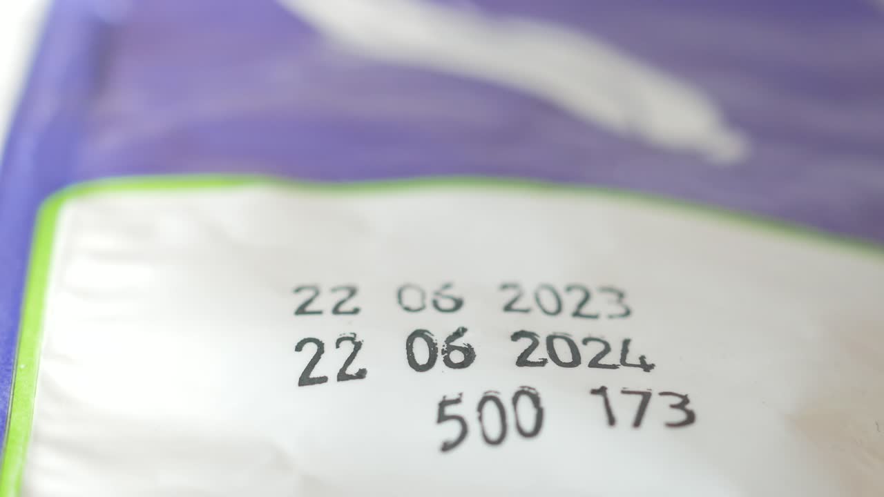 Close up of a product label with a date code