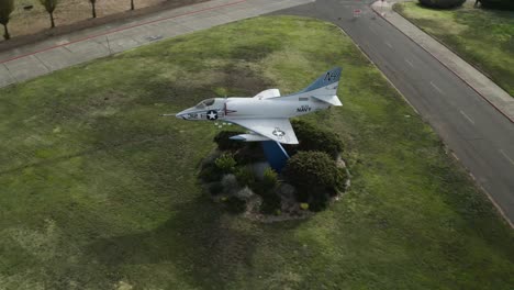 a large fighter jet on display