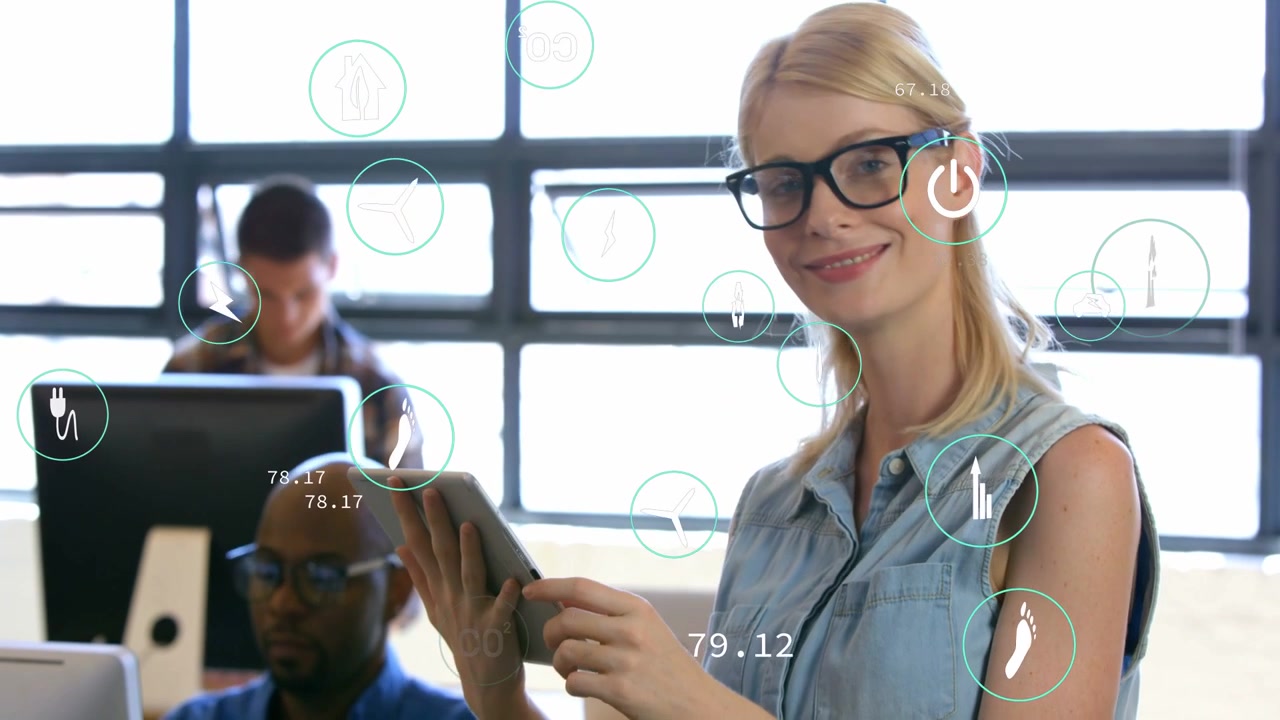 Camera moving up revealing woman tapping tablet and initiating overlay energy charts for business