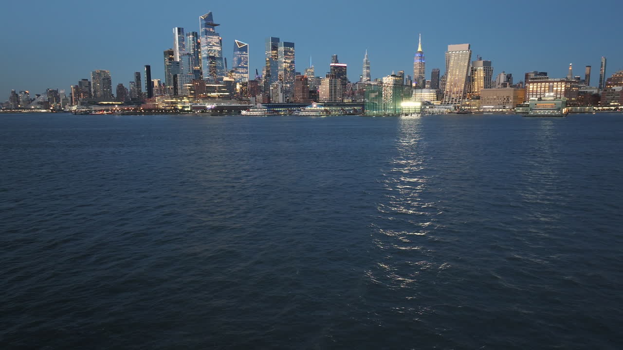 Aerial view of Midtown Manhattan and The Hudson River at night