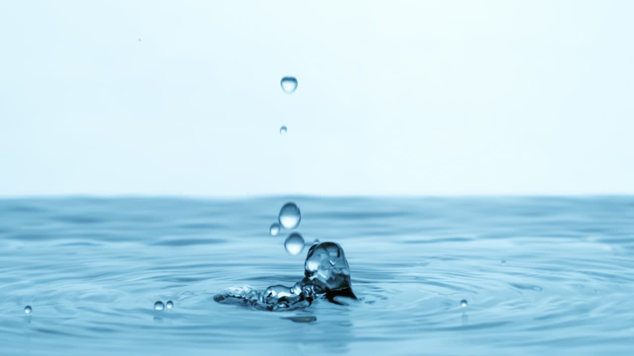 Water Drops close-up of water falls in a super slow motion. Shot on super slow motion camera 1600 fps