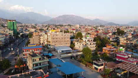 flying above city pokhara in nepal - drone shot