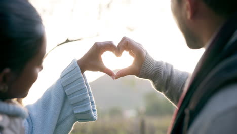 couple, hands and heart in nature for love