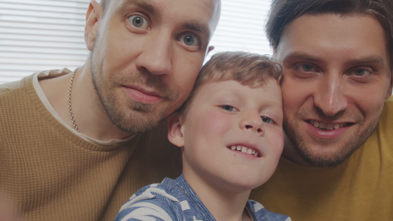 POV of Fathers and Son Taking Selfie