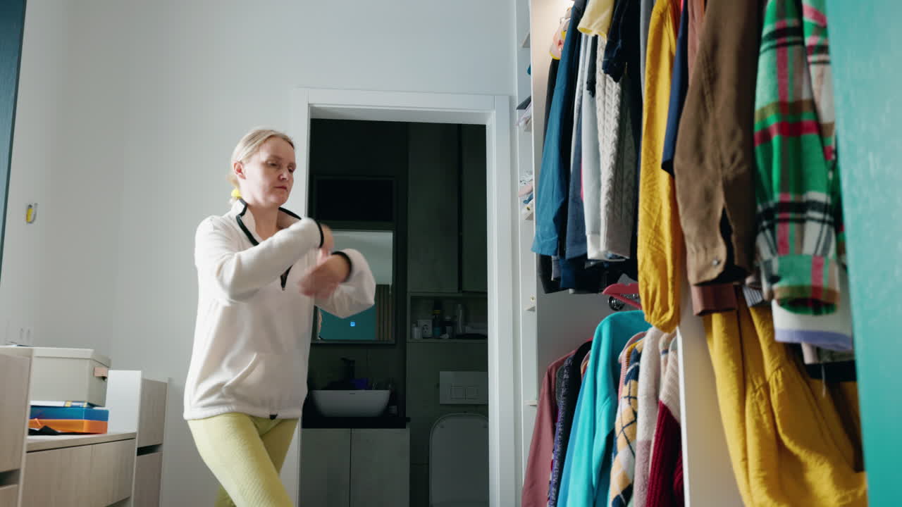 Woman Dancing in a Dressing Room