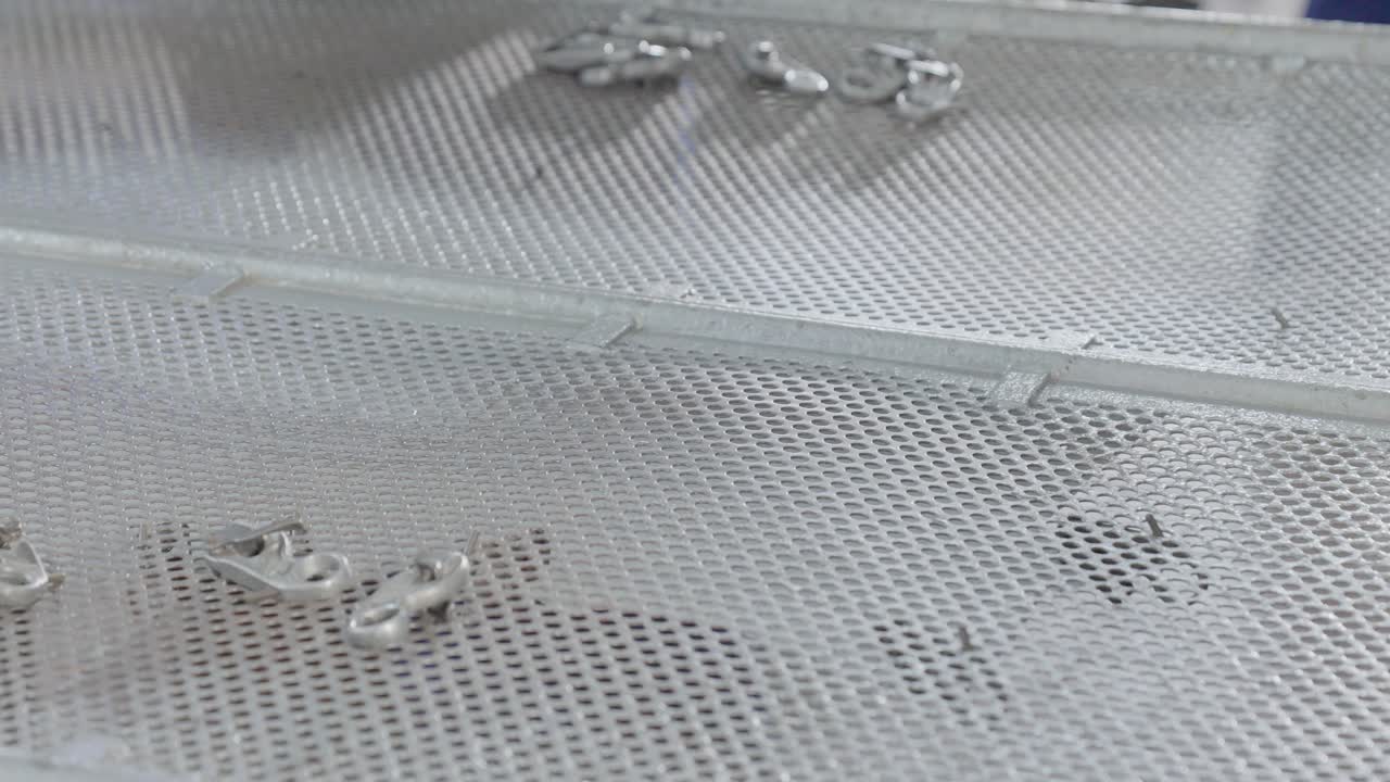 Workers Clamping Animal Hides During Drying And Stretching Process Of Leather Manufacturing, Close Up Shot.
