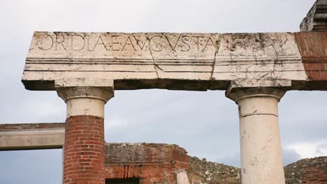 ruins of famous pompeii city, italy.building of eumachia