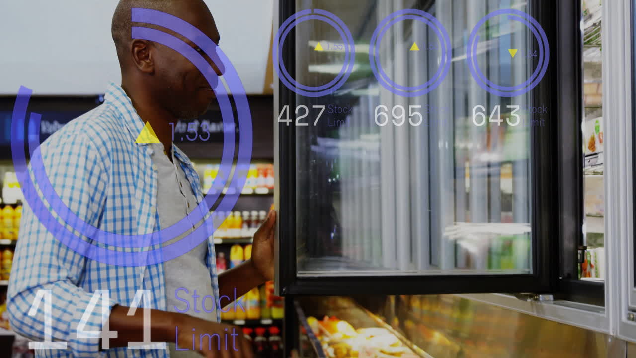 Man checking refrigerated section with stock limit data overlay animation