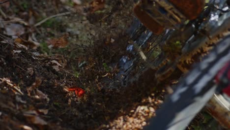 Mountain-bike-wheels-kick-up-a-cloud-of-dirt-in-extreme-slow-motion