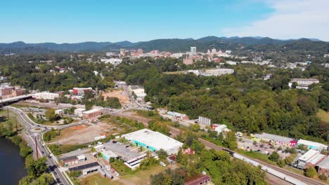 4K-Aerial-Drone-Video-of-West-Asheville,-NC-along-the-French-Broad-River