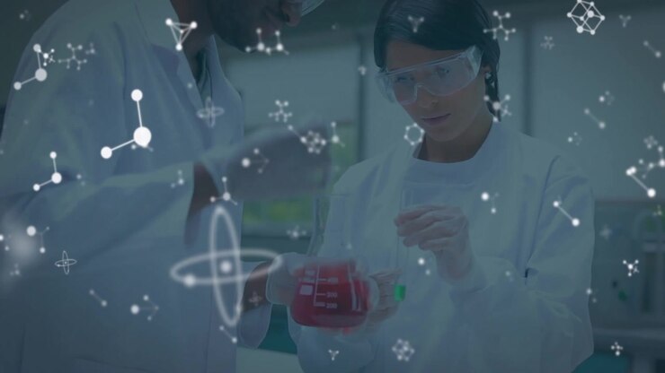 Scientists Conducting Chemical Research in Laboratory