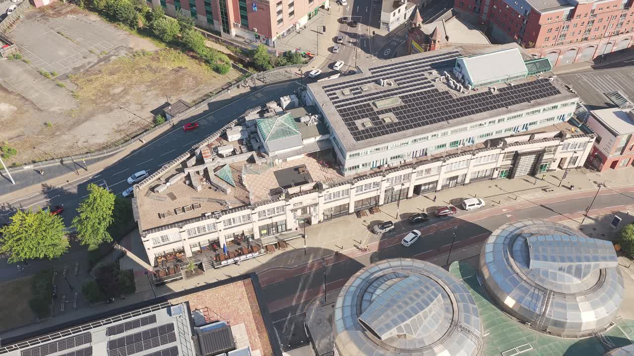 Aerial view of Sheffield Workstation in South Yorkshire, showing solar-equipped roof, glass domes, and surrounding civic architecture in the Cultural Industries Quarter