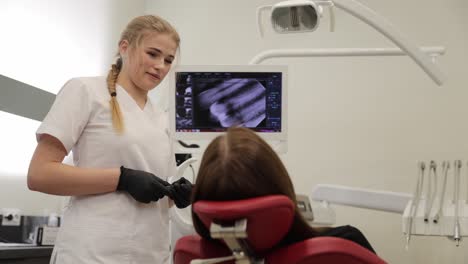 a dental assistant engages with a patient in a modern clinic setting, showcasing care and professionalism.