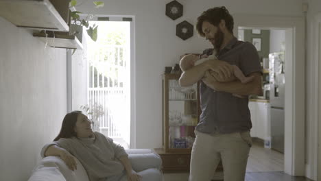 happy family with a newborn baby