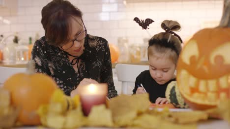 Woman-and-child-making-decorations