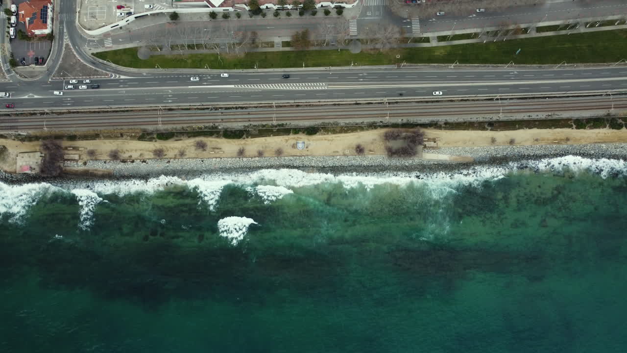 Aerial View of Coastal City with Highway and Ocean
