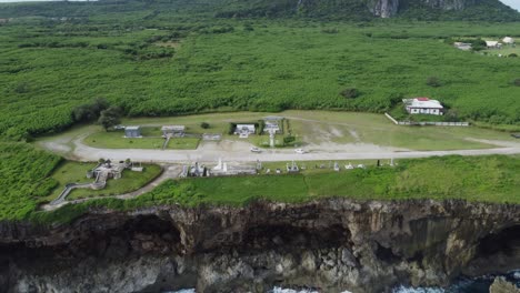 Drone-shot-of-cliffs-with-high-mountain-on-the-background