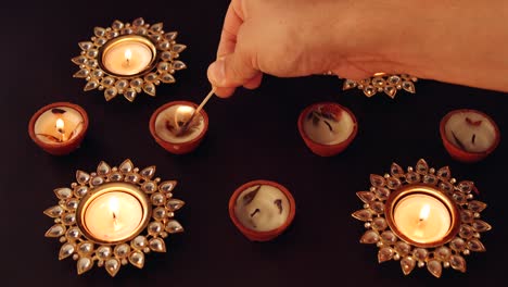 diwali diyas being lit in 2020 in day time along with surgical masks