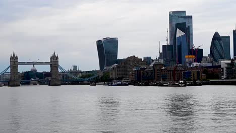 timelapse of the city of london next to the tower of london over the river thames, england