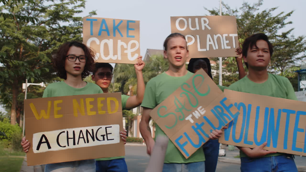 Eco Activists Protesting with Placards Outdoors