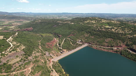 big hydraulic dam salagou lake aerial shot sunny day france