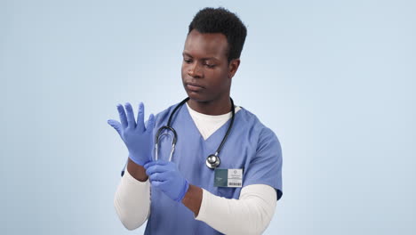 african man, doctor and gloves in studio