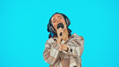 Headphones,-microphone-and-woman-singing-isolated