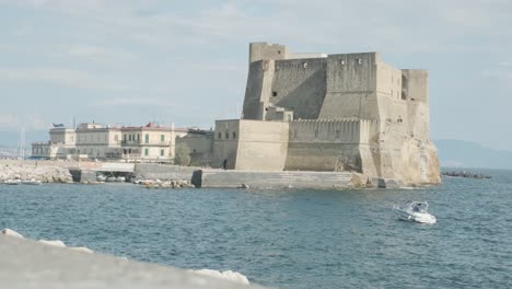 napoli, italy - may 2, 2022: a view of castel dell'ovo, city's oldest castle