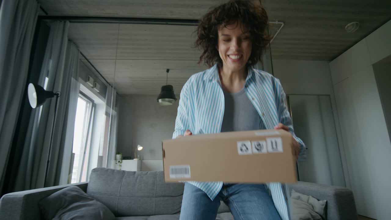 Woman Receiving Package at Home