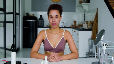 woman in underwear looking at camera