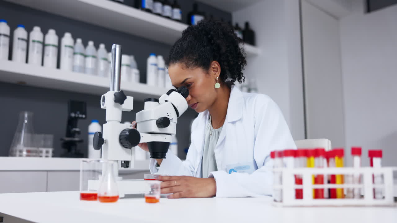 Scientist, woman and microscope with analysis