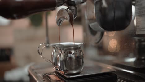 Close-up-shot-of-production-of-fresh-coffee-in-modern-coffee-shop