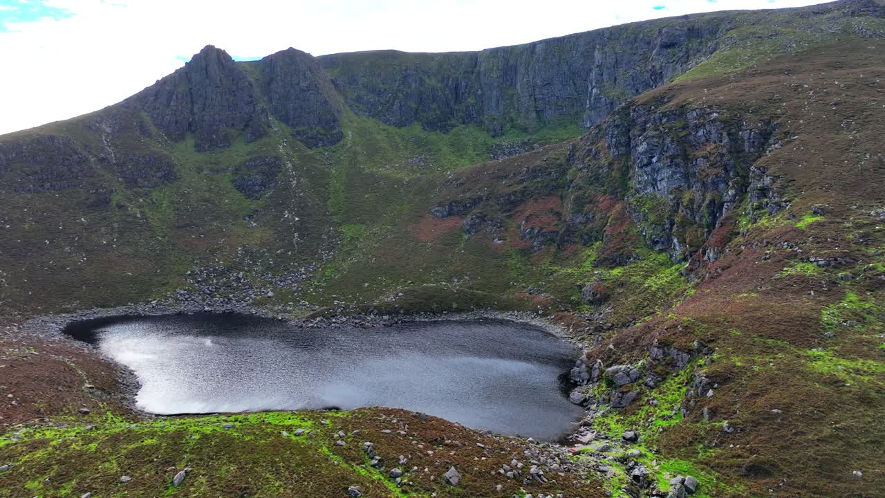 Epic Irish Mountains and locations drone flying to Crottys lake and Crottys Rock Mystical landscapes in waterford