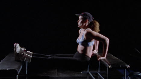 a woman doing triceps dips on a bench