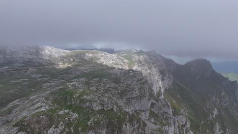 Cliff-edge-Picos-de-Europa-Spain-high-in-mountains-drone,-aerial