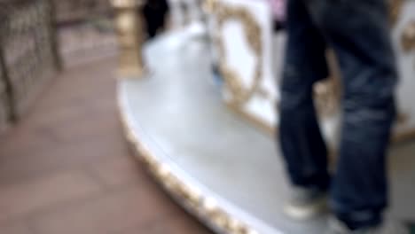 carousel, in the amusement park. the focus is blurred.