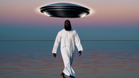 a man in traditional clothing walking on water at sunset with a ufo