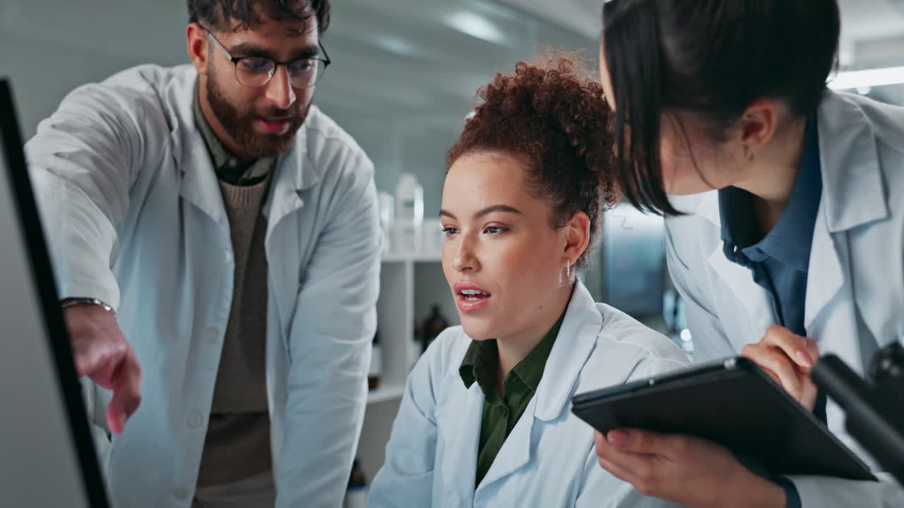 Scientists collaborating in a lab