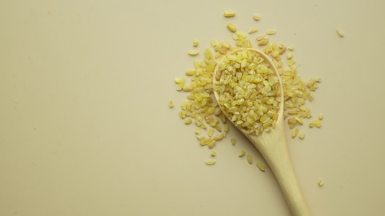 Bulgur in a Wooden Spoon