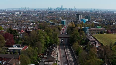 rising pan down drone shot of a1 archway bridge road london