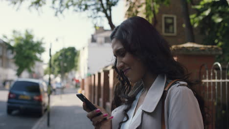 Beautiful-Indian-woman-walking-through-city