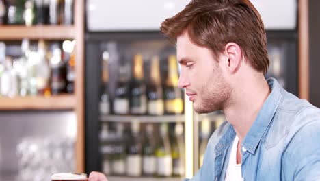 casual handsome man drinking beer