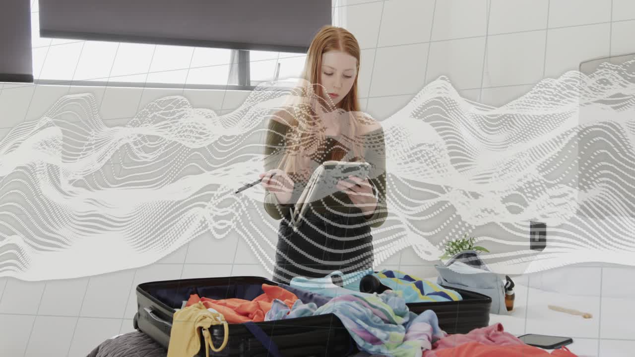 Woman opening suitcase, packing on bed, using tablet while wavy overlay moving over her for travel