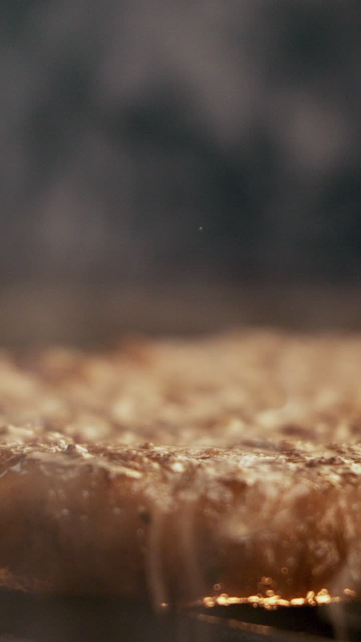 Food being cooked with smoke