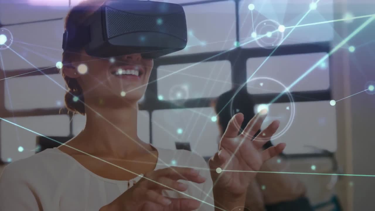 Animation of digital interface over businesswoman using vr headset