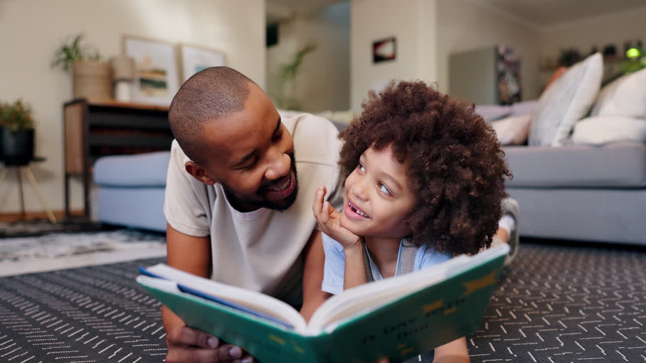 Father reading a book with his child