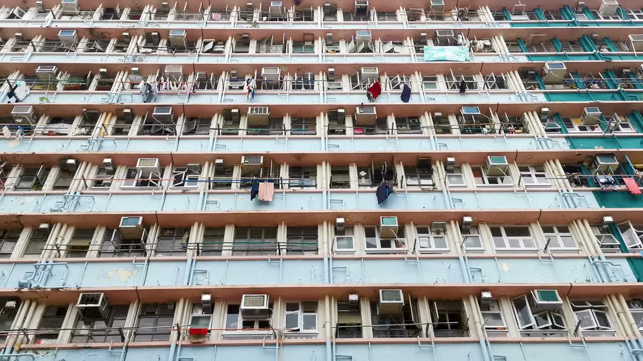 Low angle of colorful and beautiful public house, small flat rent dorm room in old town, Wong Chuk Hang, Hong Kong.