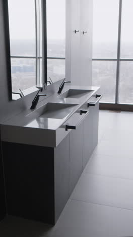 modern double sink bathroom with city view