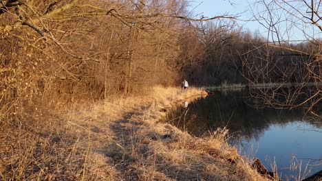 two boys cleaning up after fishing on a golden hour fill spring day