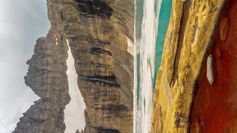 vertical 4k time lapse, iceberg lake under mount grinnell, glacier national park, montana usa